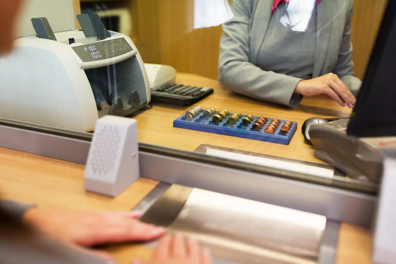 Cash deposit counter at Gale Street Post Office, Rochdale — money counter, coin tray and card terminal