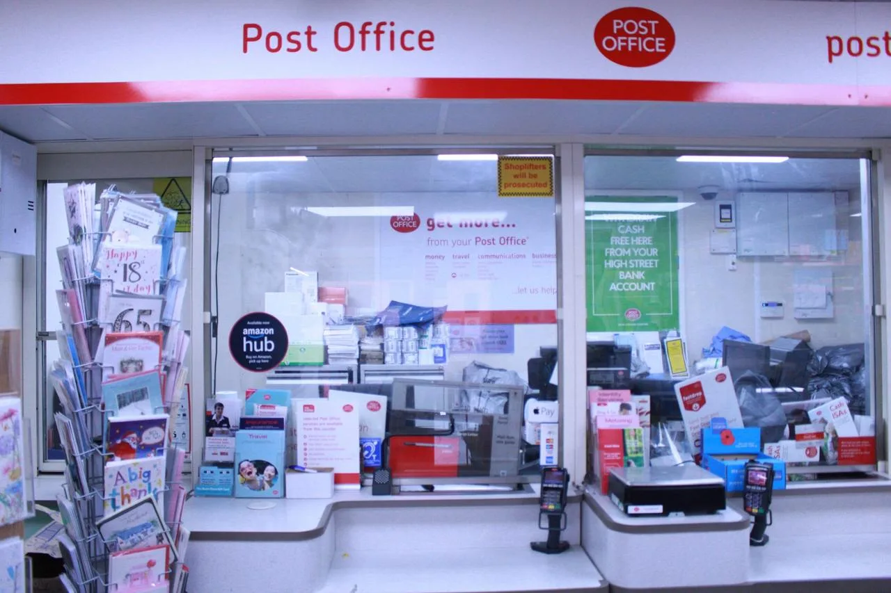 Parcel counter inside Gale Street Post Office Rochdale for Evri drop off, returns and Amazon Hub Counter