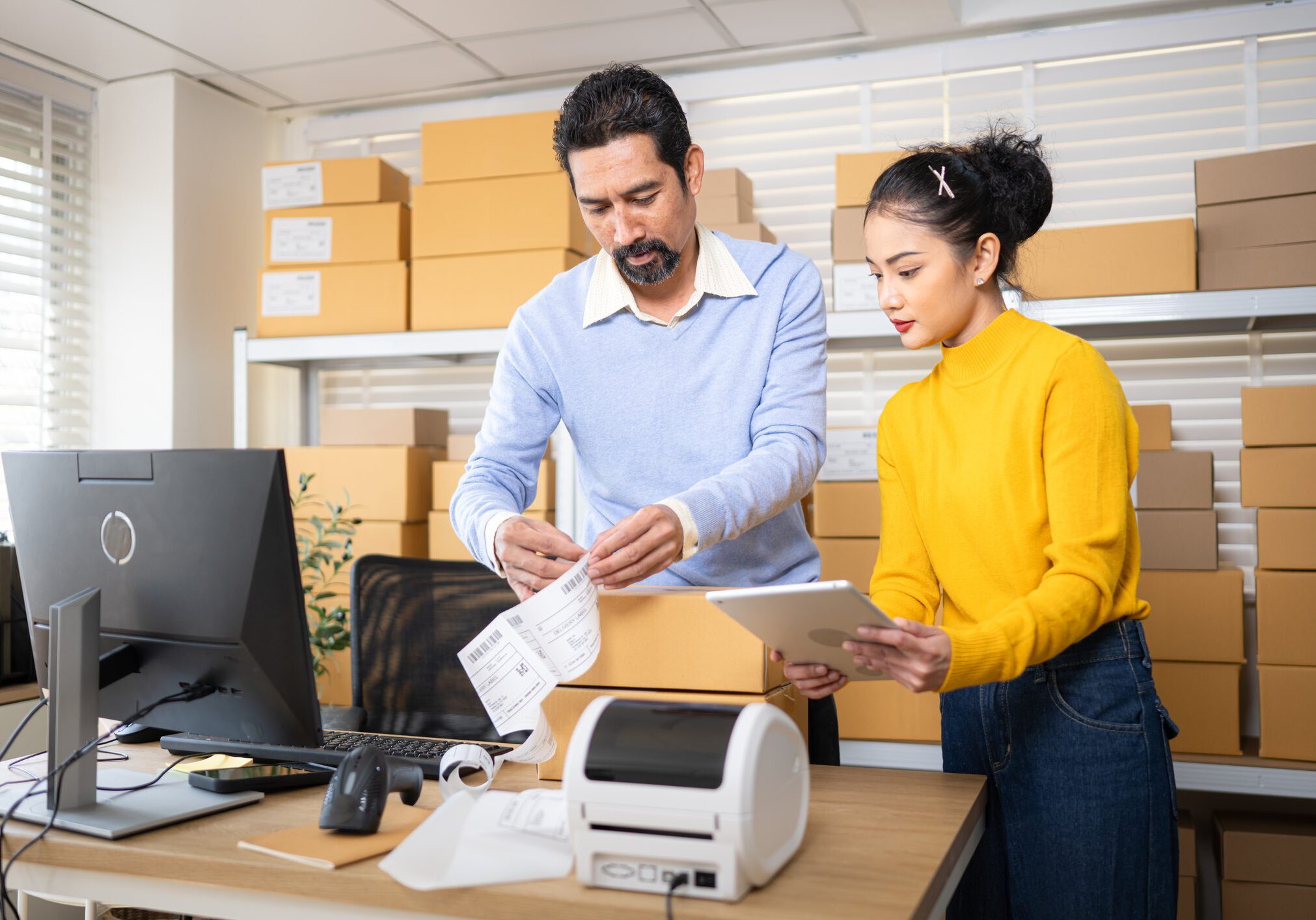 Colleagues working with shipping labels